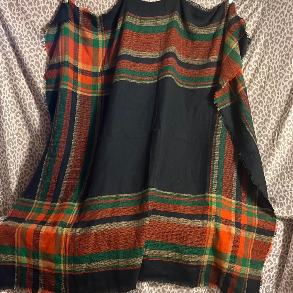 Never worn XXL scarf or wrap multicolored material unknown.